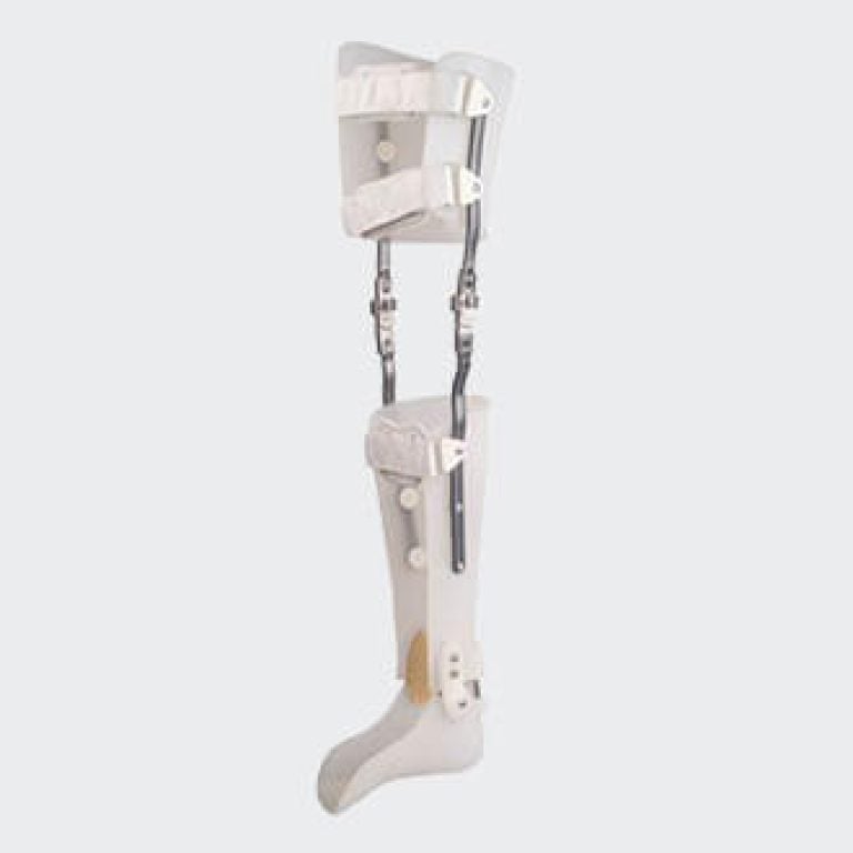 Patient walking with a modern carbon fiber KAFO long leg brace in a clinic